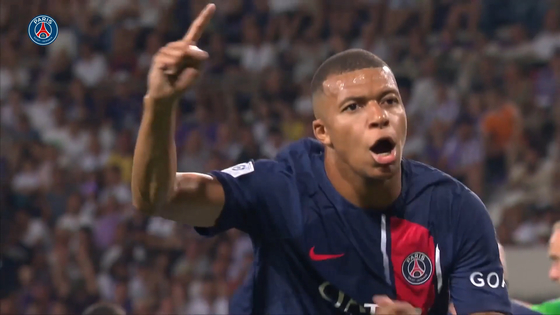 Paris Saint-Germain's Kylian Mbappe celebrates scoring a goal against Toulouse FC. [ONE FOOTBALL]