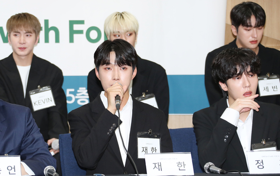 Members of boy band Omega X explain that they had been abused by their then-agency Spire Entertainment's CEO in a press conference held on Nov. 16, 2022. [NEWS1]