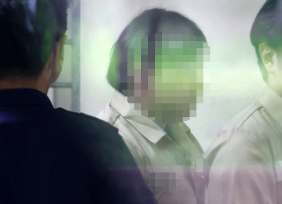 The man convicted of the attempted murder and sexual assault of a woman in her 20s leaves Busan High Court after being sentenced to 20 years in prison by the appellate court on June 12. The Supreme Court upheld the decision Thursday. [YONHAP]