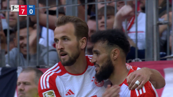 Bayern Munich's Harry Kane, left, celebrates scoring with Noussair Mazraoui during a Bundesliga match against VfL Bochum at Allianz Arena in Munich, Germany on Saturday. [ONE FOOTBALL]