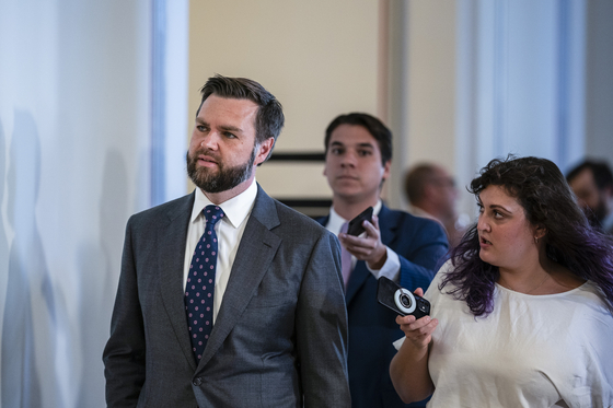 Sen. J.D. Vance (R-Ohio) during an AI Forum at the U.S. Capitol in Washington, on Sept. 13, 2023. “My grandfather, who I never saw wear a suit, who didn’t own a suit as far as I know, would have never shown up to work in the United States Senate without dressing properly,” said Vance about the relaxing of the Senate dress code, which he declared would demean America’s government institutions. [Haiyun Jiang/The New York Times]