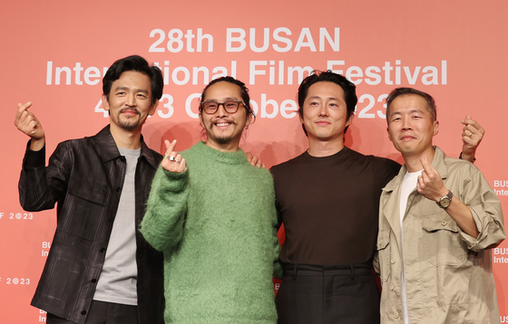 From left: actor John Cho, director and actor Justin Chon, actor Steven Yeun and director Lee Isaac Chung pose for a photo during the press conference for the “Special Program in Focus: Korean Diasporic Cinema” session at the KNN Theater in Busan on Friday. [SONG BONG-GEUN]