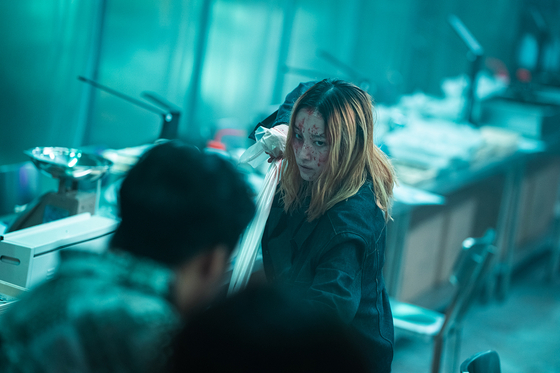 A scene from the Netflix film ″Ballerina,″ starring Jeon Jong-seo as Ok-ju, a former bodyguard who seeks revenge for her deceased best friend against the head of a sex trafficking ring. [NETFLIX]