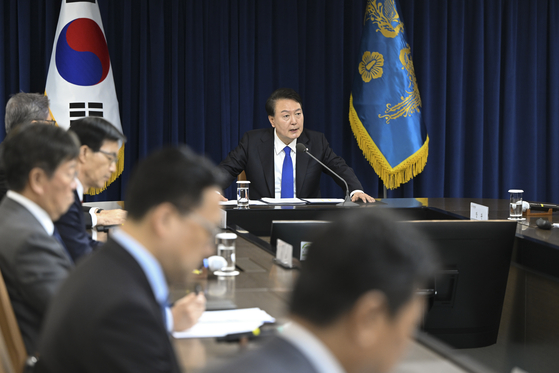 President Yoon Suk Yeol speaks during an emergency meeting with his aides discussing the security situation in Israel at the presidential office in Seoul on Wednesday. [JOINT PRESS CORPS] 