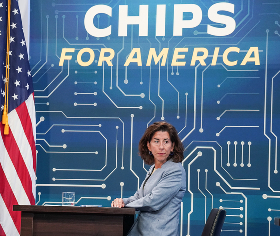 U.S. Secretary of Commerce Gina Raimondo listens during a virtual meeting with US President Joe Biden Deputy Secretary of Defense Kathleen Hicks, CEO's and labor leaders called to discuss the importance of passing the Chips Act to bolster America's competitive edge, its manufacturing power and national security at the White House in Washington, DC in July 2022. [UPI/YONHAP]