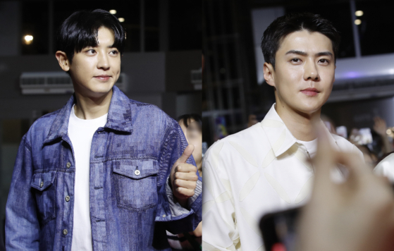 Boy band EXO member Chanyeol, left, and fellow member Sehun [NEWS1]