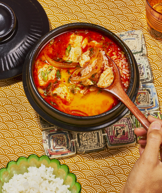 Sundubu jjigae, or spicy tofu soup, in James Park's cookbook "Chili Crisp" [JAMES PARK]