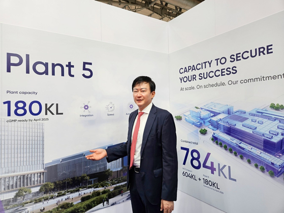 John Rim, Samsung Biologics CEO, poses for photo at the company's booth during the CPHI Worldwide 2023 held in Barcelona, Wednesday. [SAMSUNG BIOLOGICS]
