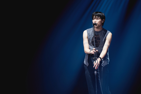 Singer Woodz kicked off ″OO-LI and″ encore world tour with a two-day performance at the SK Olympic Handball Gymnasium in Songpa District, southern Seoul over the weekend [EDAM ENTERTAINMENT] 