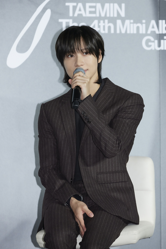 Taemin of boy band SHINee answers questions from local reporters during a press conference held on Monday at the Megabox Seongsu branch in eastern Seoul ahead of the release of his fourth EP ″Guilty″ at 6 p.m. [SM ENTERTAINMENT]
