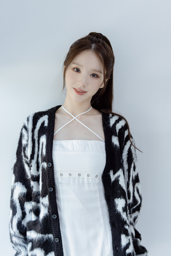  Heejin from girl group ARTMS dropped her first EP ″K″ on Tuesday. [MODHAUS]