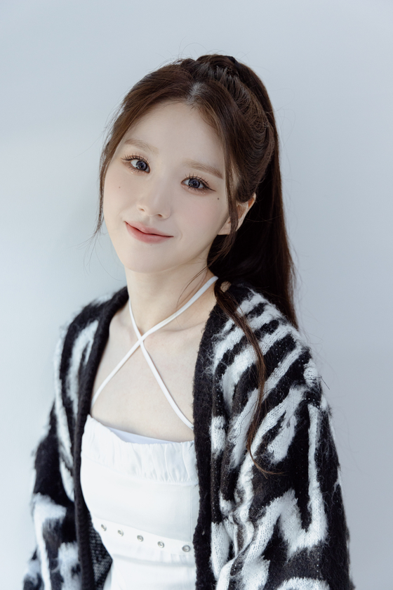  Heejin from girl group ARTMS dropped her first EP ″K″ on Tuesday. [MODHAUS]