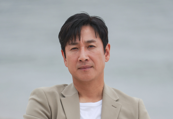Actor Lee Sun-kyun poses for a photo during the Cannes International Film Festival held in Cannes, France, on May 21. [NEWS1]