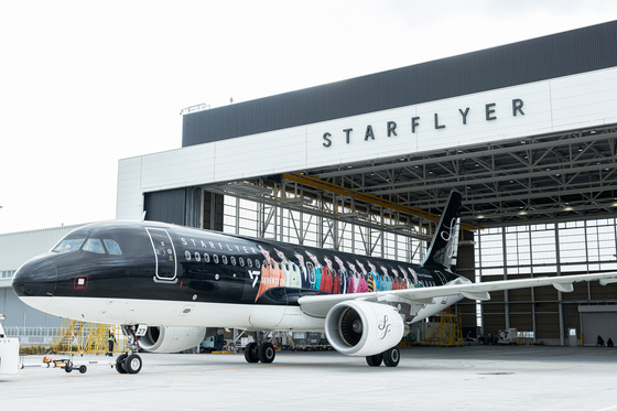 Japanese Airline Star Flyer has a special airplane covered with an image of Seventeen members. [HYBE JAPAN]