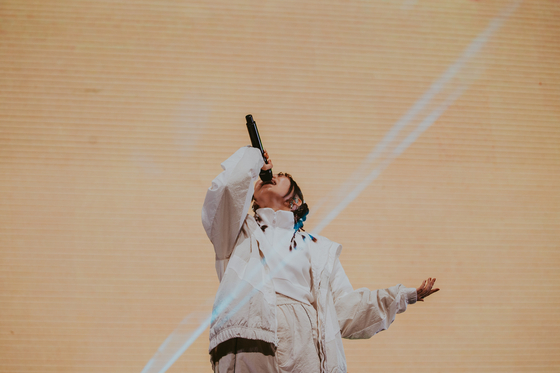 Japanese project group Yoasobi's vocalist Ikura performs during the group's first concerts in Korea, held last Saturday and Sunday at the Hwajung Tiger Dome in central Seoul. [LIVET, KATO SHUMPEI]