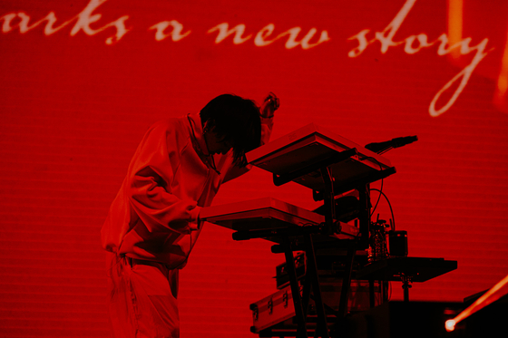 Japanese project group Yoasobi's composer Ayase performs during the group's first concerts in Korea, held last Saturday and Sunday at the Hwajung Tiger Dome in central Seoul. [LIVET, KATO SHUMPEI]