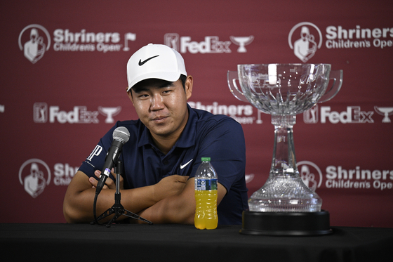 Tom Kim, also known as Kim Joo-hyung, speaks during a press conference after his win during the final round of the Shriners Children's Open at TPC Summerlin on Oct. 15, 2023 in Las Vegas, Nevada. [GETTY IMAGES]