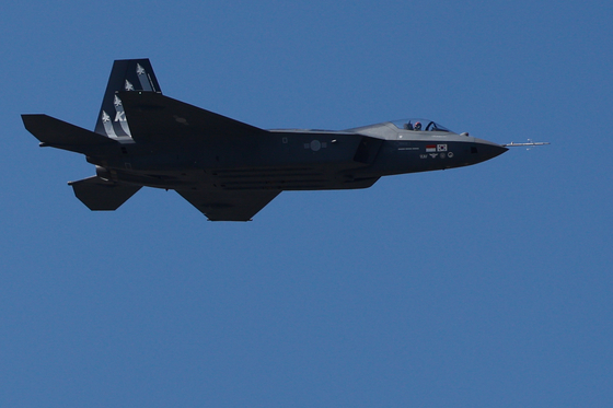 KF-21 Boramae, the country's first domestically developed fighter jet, flies over Seoul Airport in Seongnam, Gyeonggi, during a test flight held a day before the six-day Seoul International Aerospace & Defense Exhibition (ADEX) 2023 officially kicks off. [NEWS1]