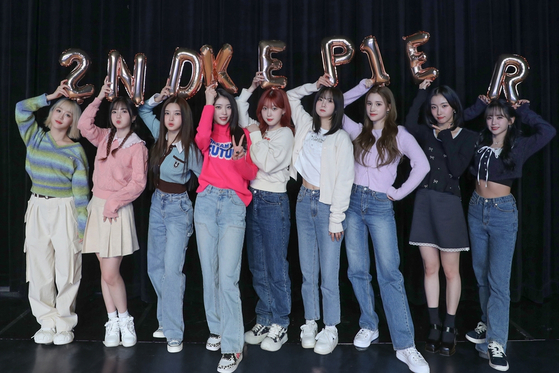Members of the girl group Kep1er celebrate their second debut anniversary in this picture released by the group. [WAKEONE, SWING ENTERTAINMENT]