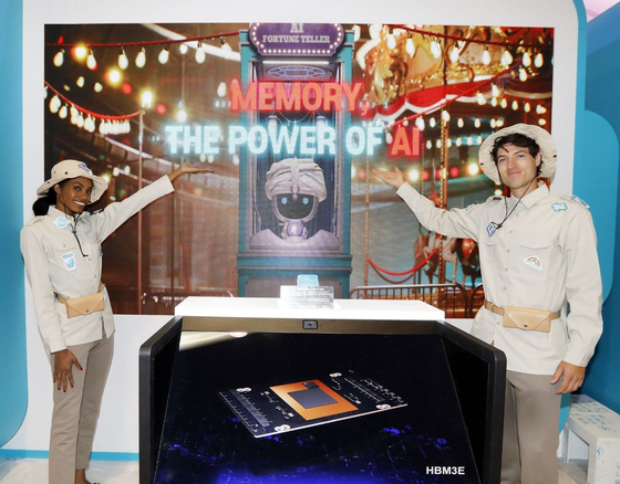 Staff at SK introduce an AI fortune teller powered by SK hynix's HBM3E chip. [SK GROUP]