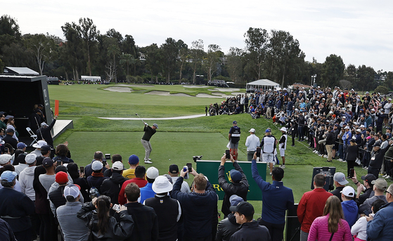 Adam Scott of Australia plays his shot from the tenth tee during the third round of the The Genesis Invitational at Riviera Country Club on Feb. 18, 2023 in Pacific Palisades, California. [GETTY IMAGES]
