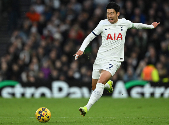 Tottenham Hotspur's Son Heung-min prepares to cross the ball during the Premier League match against Brighton & Hove Albion at the Tottenham Hotspur Stadium in London on Saturday. [AFP/YONHAP] 