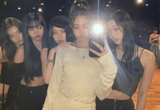 Annie Moon, far right, poses for a photo with other trainees under The Black Label. [SCREEN CAPTURE]