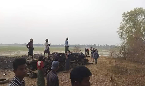 A pile of firewood is piled up for the funeral of those who have been victims of crime in a village in Sagaing, Myanmar on March 2, 2023. [AP/YONHAP]