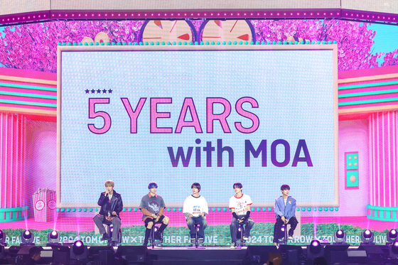 Boy band Tomorrow X Together performing at the ″2024 TXT Fanlive Present X Together,″ a meet and greet held on March 2 and 3 to celebrate the band's fifth anniversary of debut [BIGHIT MUSIC]
