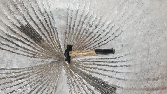 The work in progress for William Sang-hyeob Lee's ″Untitled″ (2023), made from a 31-kilogram (68-pound) silver ingot [WILLIAM SANG-HYEOB LEE]