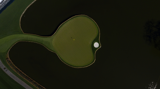 An aerial view of the 17th hole at the Stadium Course at TPC Sawgrass shot on March 4, 2021 in Ponte Vedra Beach, Florida. [PGA TOUR]