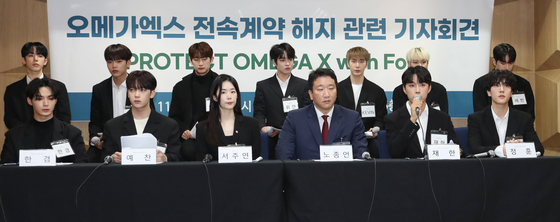 Boy band Omega X states that the band members had been assaulted by then-agency Spire Entertainment's CEO Kang Seong-hee in a press conference held at the Seoul Bar Association's Human Rights Room in southern Seoul on Nov. 16, 2022. [NEWS1]
