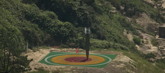 A Korean Tactical Surface-to-Surface Missile strikes a target during a test at an undisclosed location in this undated filed photo. [AGENCY FOR DEFENSE DEVELOPMENT]