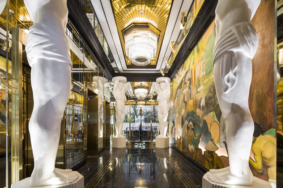 The elevator foyer leading to the reception desk at Capella Hanoi. [SUN GROUP]