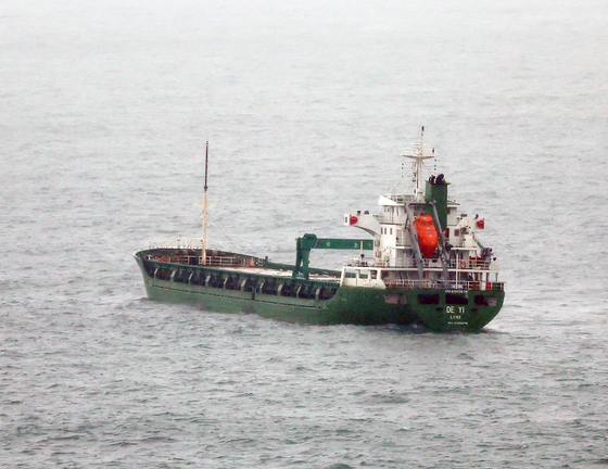 A 3,000-ton ship, Deyi, is forced to dock in waters off Gamcheon Port in the southeastern city of Busan on Wednesday. [YONHAP]