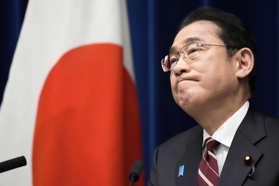 Japan's Prime Minister Fumio Kishida listens to a question from a journalist, during a press conference in Tokyo on March 28, 2024. [AP/YONHAP]