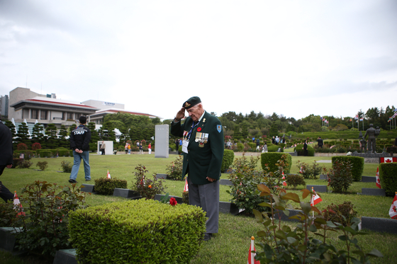 A Korean War veteran from Canada pays his respects to fallen compatriots during a ceremony held at the United Nations Memorial Cemetery in Busan on Tuesday, the 73rd anniversary of the Battle of Kapyong. 