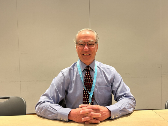 Queensland Pacific Metals (QPM) CEO Stephan Grocott takes a photo during an exclusive interview with the Korea JoongAng Daily on the sidelines of InterBattery 2024 at Coex, southern Seoul, on Wednesday. [SARAH CHEA] 
