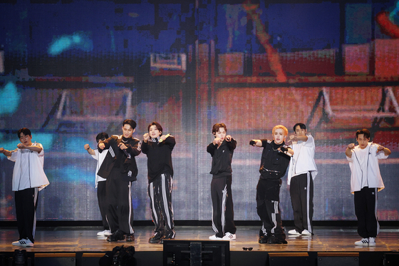 Seventeen performs at the boy band's ″'Follow Again' in Seoul' encore concert held Saturday at the Seoul World Cup Stadium in Mapo District, western Seoul. [PLEDIS ENTERTAINMENT]