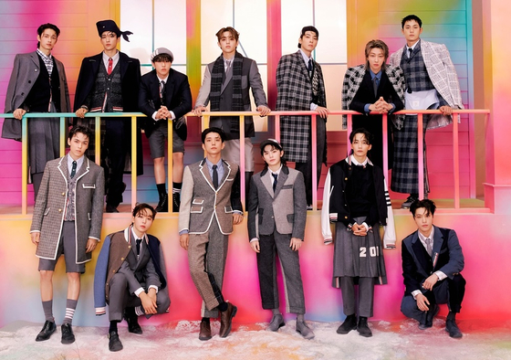 Boy band Seventeen dropped its first compilation album, ″17 is Right Here,″ on Monday. [PLEDIS ENTERTAINMENT]