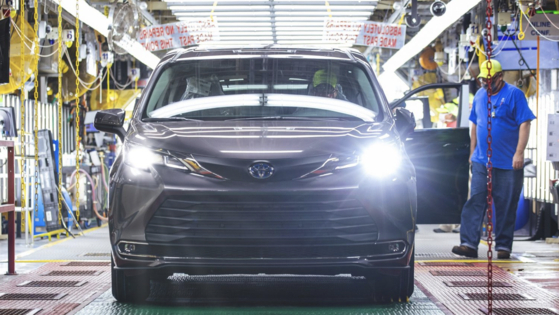 A Toyota Motor worker makes a car at its manufacturing factory in Indiana. [TOYOTA MOTOR USA]