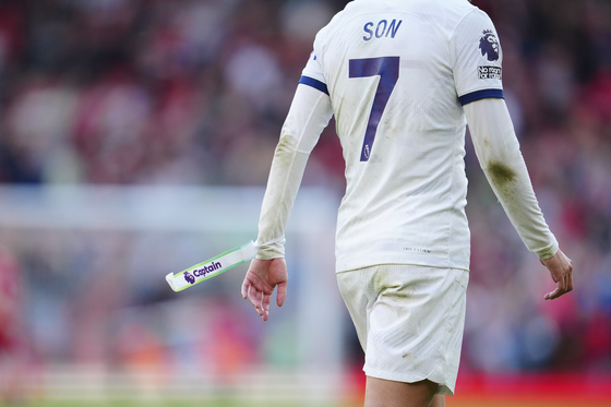 Tottenham's Son Heung-min leaves the pitch at the end of the match between Liverpool and Tottenham Hotspur at Anfield in Liverpool, England on Sunday. [AP/YONHAP]