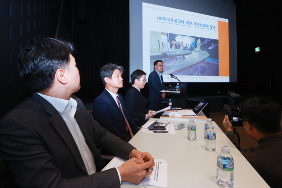 Officials from Hanwha Ocean hold a press conference on March 5 after filing a police complaint against HD Hyundai Heavy Industries, alleging that executives from their rival were responsible for a convicted breach of military secrets, which included Hanwha Ocean’s warship design. [YONHAP]
