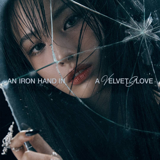 Jini, a former member of Nmixx, will drop her first EP ″An Iron Hand In A Velvet Glove″ on Oct. 11. [ATOC]