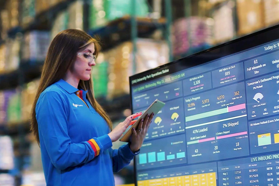 An employee at CJ Logistics' U.S. logistics center monitors the operations. [CJ LOGISTICS]