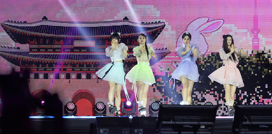 NewJeans on stage at the “2024 Korea On Stage — New Generation" event held at Gyeongbok Palace's Geunjeongjeon on Tuesday. [NEWS1] 