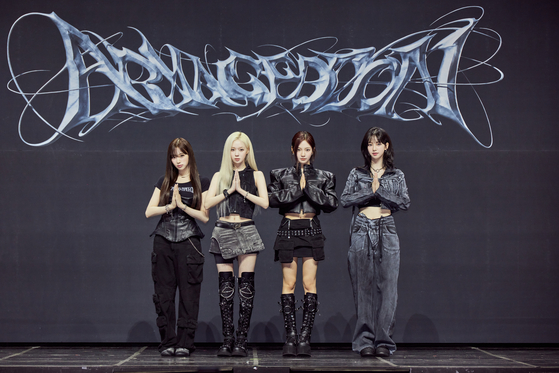 aespa poses for the camera during a press showcase held Monday afternoon at Blue Square’s Mastercard Hall in Yongsan District, central Seoul, ahead of the 6 p.m. release of “Armageddon.” [SM ENTERTAINMENT]
