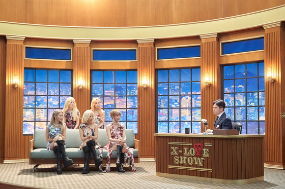 (G)I-DLE introduced its new EP "I love" on Monday with a vintage talkshow-inspired session streamed online. [CUBE ENTERTAINMENT]