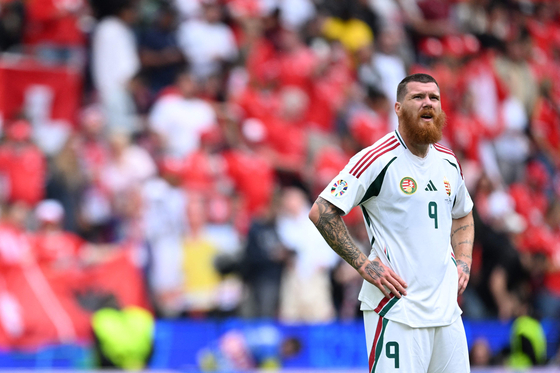 Hungary forward Martin Adam reacts after losing their Euros opener against Switzerland 3-1 at the Cologne Stadium in Cologne, Germany on Saturday. [AFP/YONHAP]