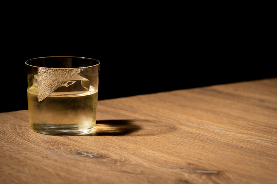 The sikhye milk punch is organic rice soju and Korean spiced rum infused with pumpkin sikhye (sweet rice juice) milk whey and topped with Amaro dust. [ZEST]